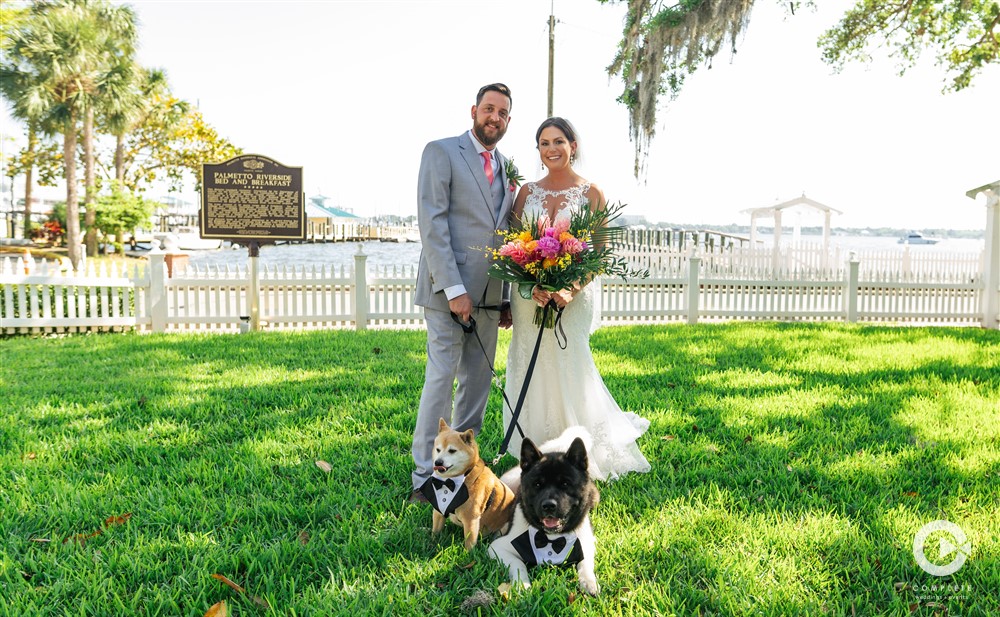 Bride and groom on the outside lawn in Palmetto, Florida. 