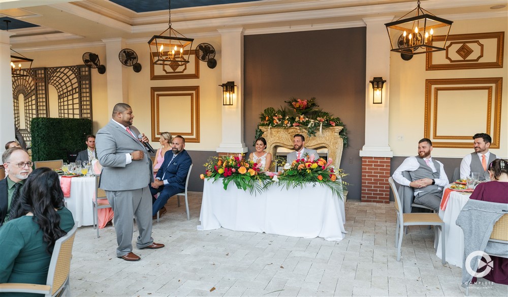 Bride and groom tropical sweethearts table at wedding reception at Palmetto bed and breakfast.